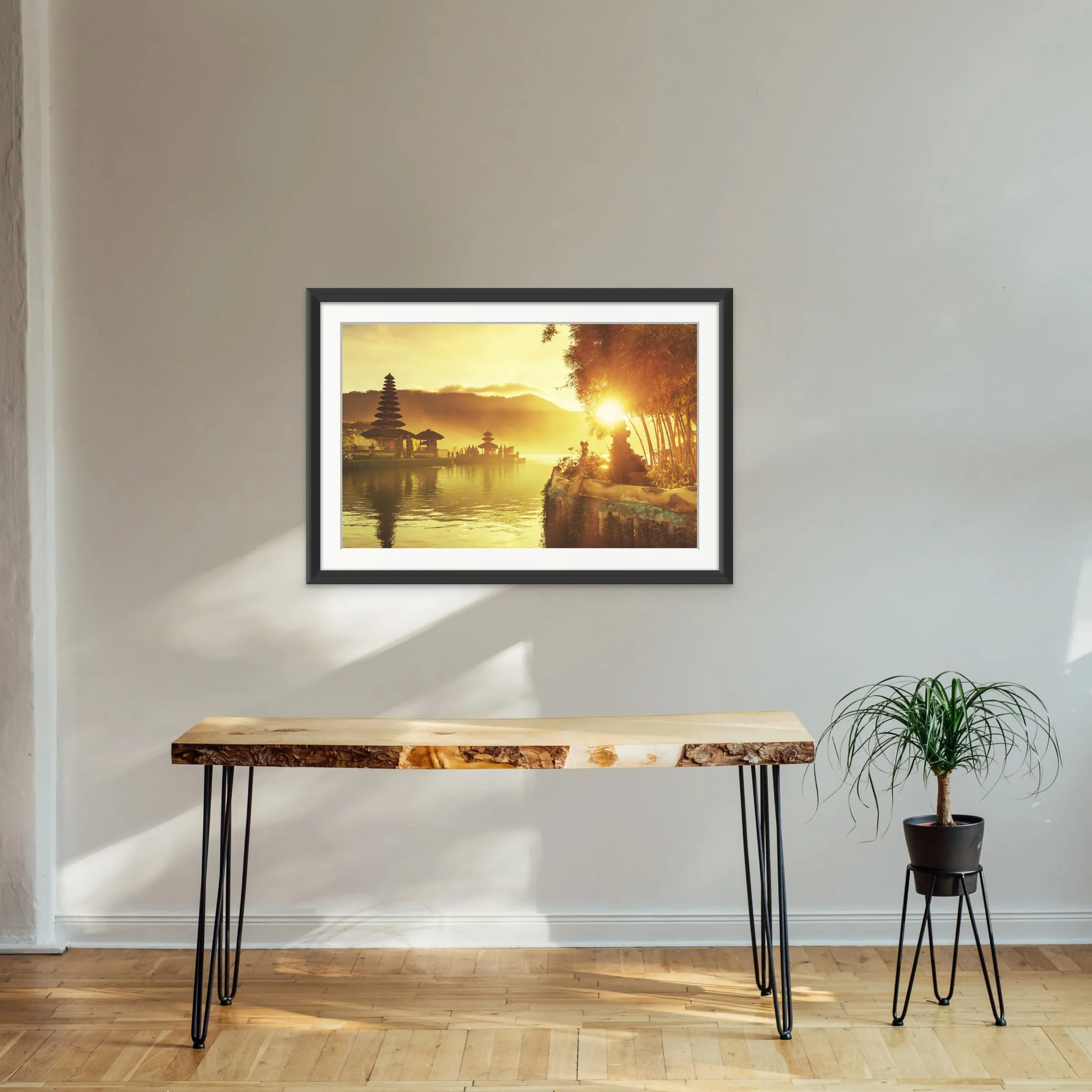 Bali Temple at Sunrise shown framed on a wall.